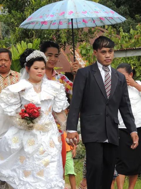 The bride walked to the village hall