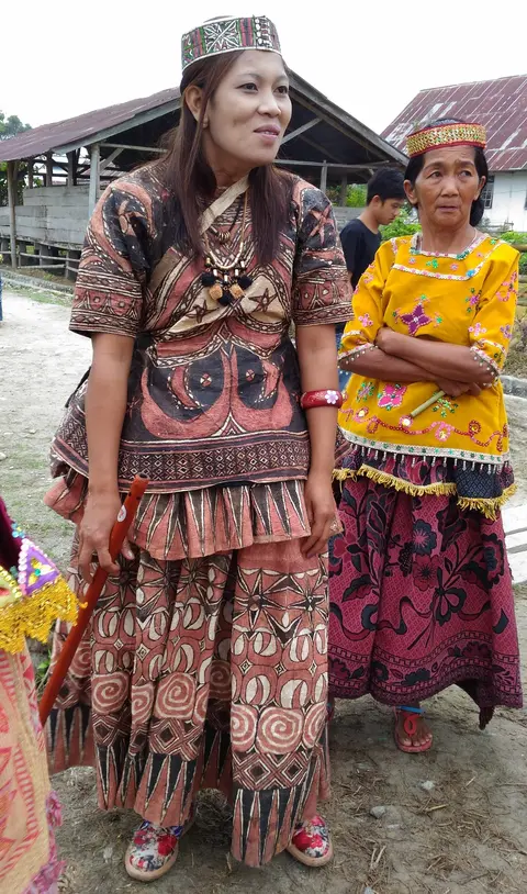 Brown color cloth was made of bark; the yellow one was from ordinary fabrics 